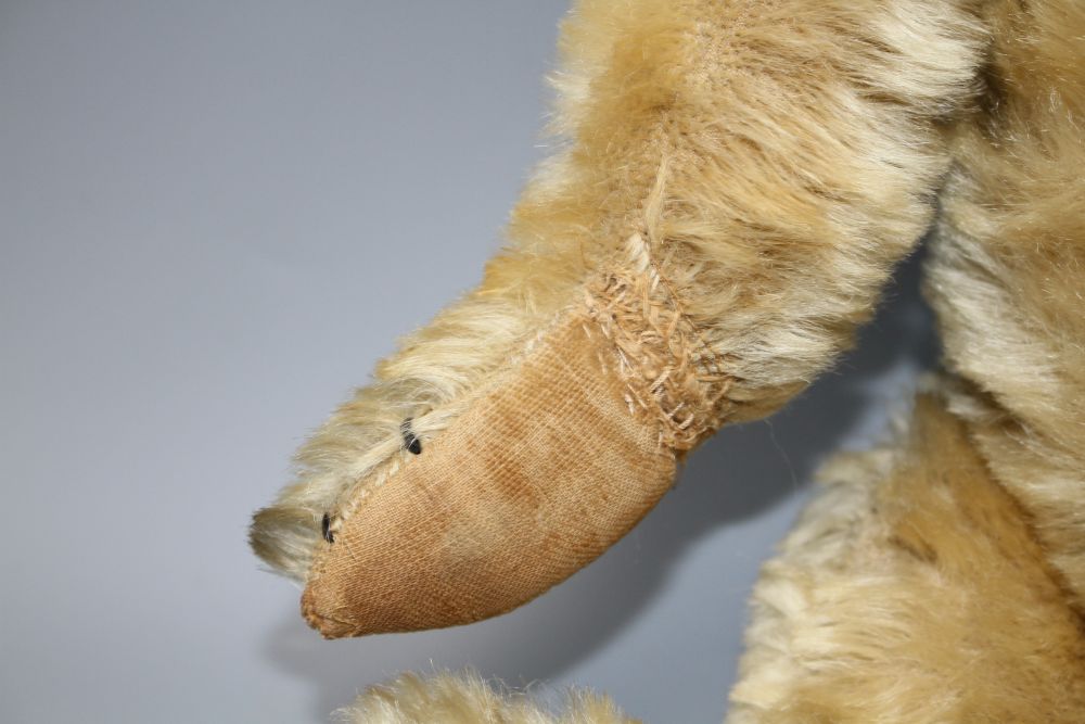 A Chiltern Hugmee c.1930 bear, 18in., blond mohair, hair loss front tummy, repair to right paw, split to left paw